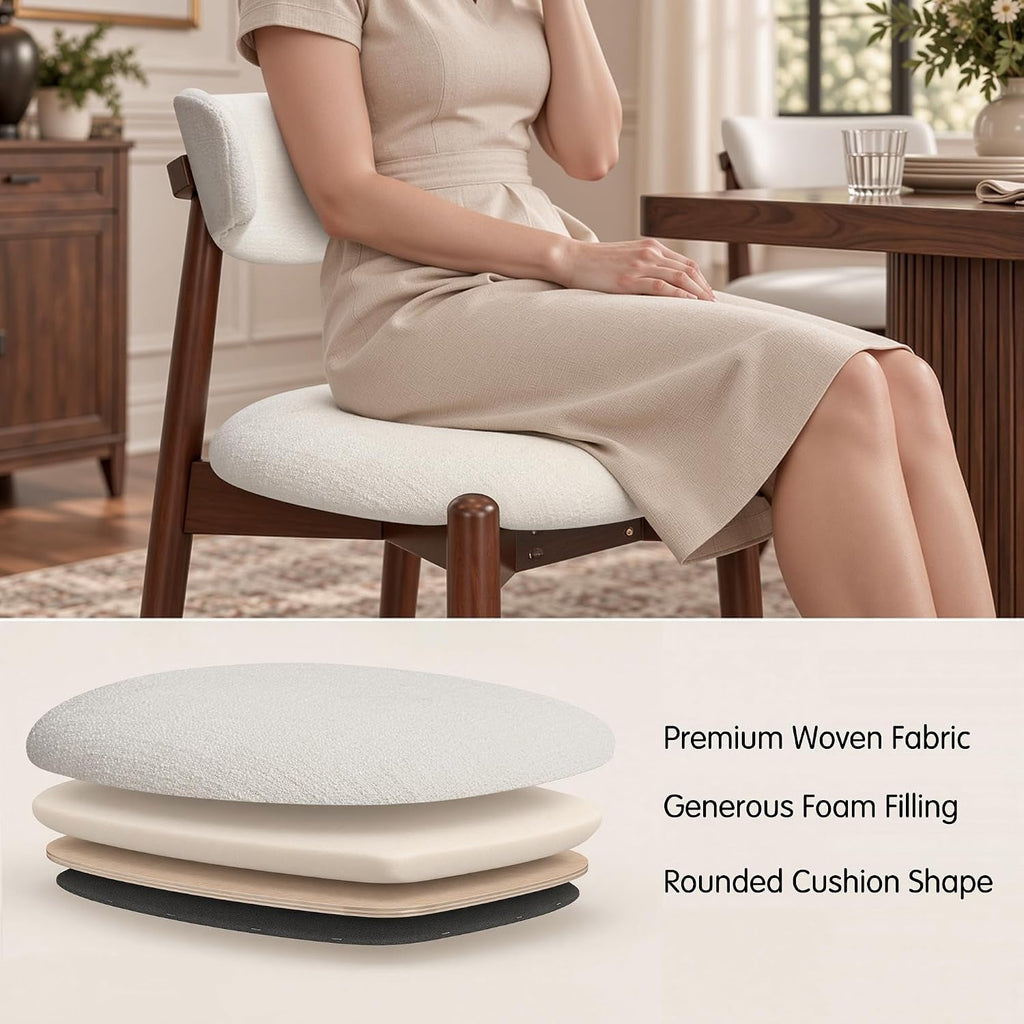 Four Cream Upholstered Dining Chairs Curved Backrests